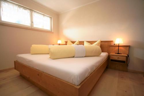 Postel nebo postele na pokoji v ubytování Ferienwohnung Katja