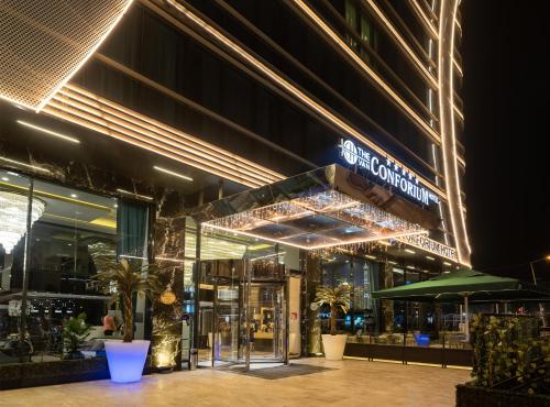 a store front of a building at night at The Conforium Hotel Van in Van