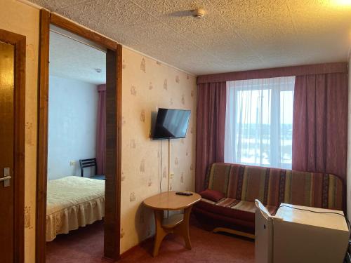 TV a/nebo společenská místnost v ubytování Riverside Motel Jelgava
