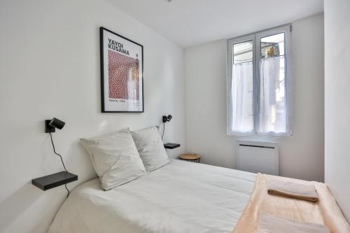 Postel nebo postele na pokoji v ubytování L'érable #Netflix #Centre-ville