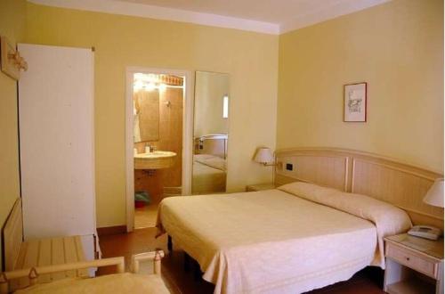 Katil atau katil-katil dalam bilik di Hotel Viticcio