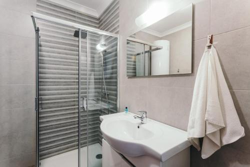 a bathroom with a sink and a shower at Best Houses 05 - The Best Location in Ferrel