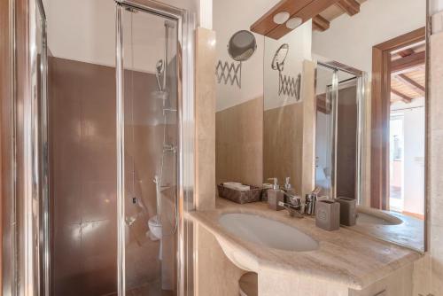 a bathroom with a sink and a shower at Quirinale View 52 in Rome