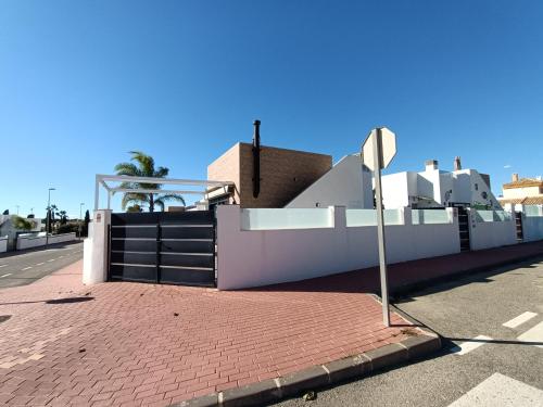 a building with a staircase on the side of a street at Villa Sur - Sucina - 8409 in Sucina