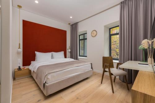 Una cama o camas en una habitación de Sophia Hotel Kyiv