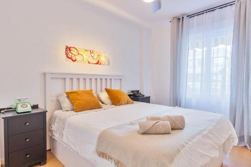 Posteľ alebo postele v izbe v ubytovaní Precioso apartamento a 5 minutos andando de la playa