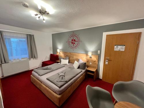 Katil atau katil-katil dalam bilik di BnB Fliegerhaeusle Hagnau 24h Self Check In