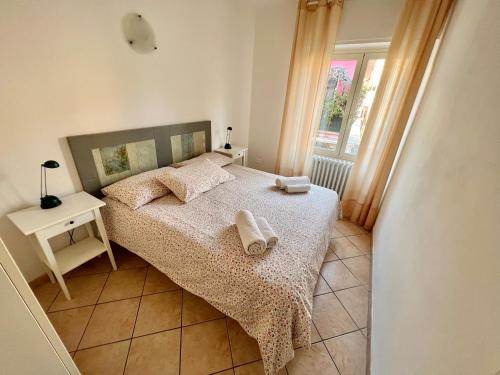 Postel nebo postele na pokoji v ubytování Borgo Antico Apartments