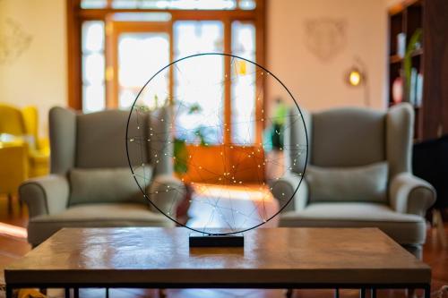 a mirror sitting on top of a wooden table at Hotel El Tejar & Spa in Vilaflor