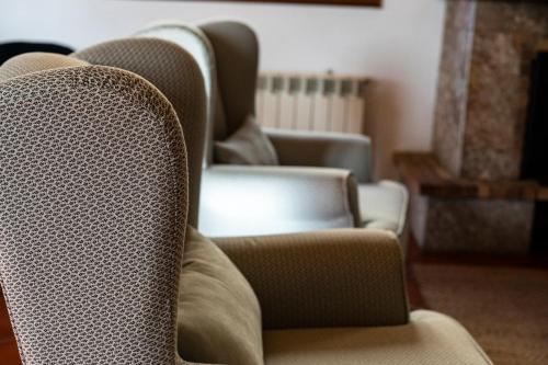 a pair of chairs in a living room at Hotel El Tejar & Spa in Vilaflor