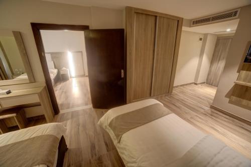 Postel nebo postele na pokoji v ubytování mass paradise2