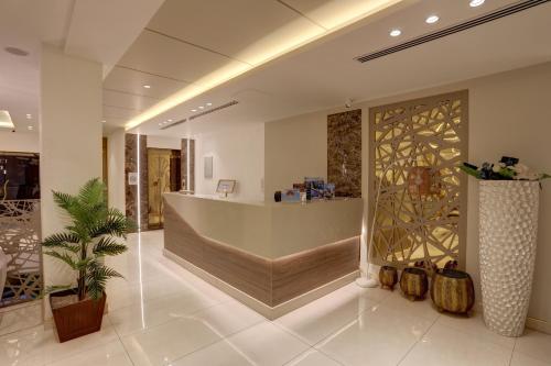 a lobby with a reception desk in a building at mass paradise2 in Aqaba