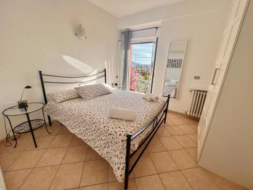 Ένα ή περισσότερα κρεβάτια σε δωμάτιο στο Borgo Antico Apartments