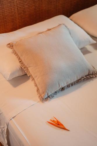 Una cama o camas en una habitación de Residence AU 'TI SUCRIER