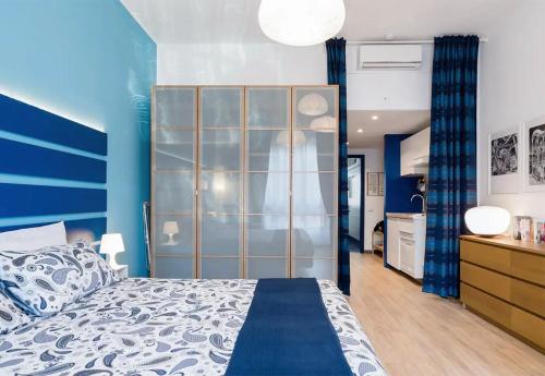 Posteľ alebo postele v izbe v ubytovaní Appartamento Blu a Milano zona Ripamonti vicino allo IEO