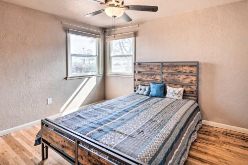 a bedroom with a bed and a ceiling fan at Colorado Springs Home Game Room, 3 Mi to Downtown in Colorado Springs