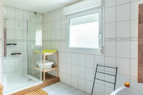 Kúpeľňa v ubytovaní Le Coeur des Vosges - Jacuzzi disponible toute l'année