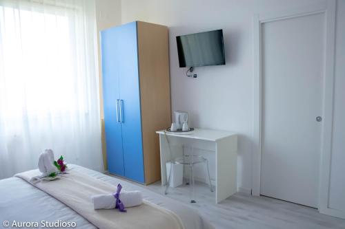 Postel nebo postele na pokoji v ubytování B&B L'incanto degli Artisti