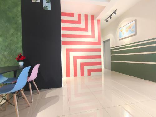 a dining room with a table and chairs at Pavilionvillie M1T584 by irainbow in Simpang Pulai