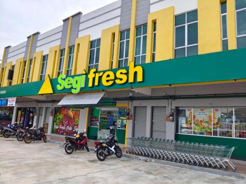 a group of motorcycles parked in front of a store at Pavilionvillie M1T584 by irainbow in Simpang Pulai