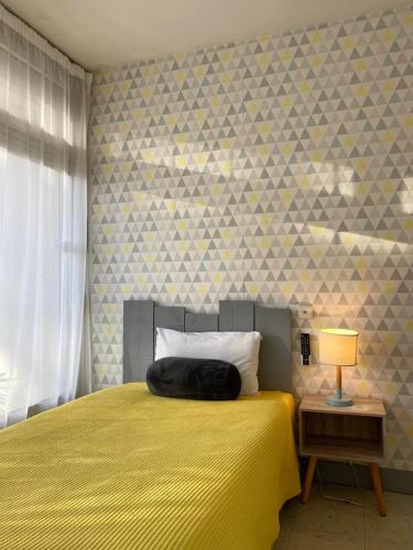 hotel l'échappée d'oléronにあるベッド