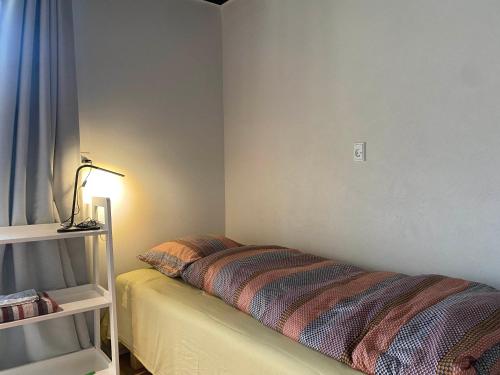 Cama o camas de una habitación en Tornby Guesthouse