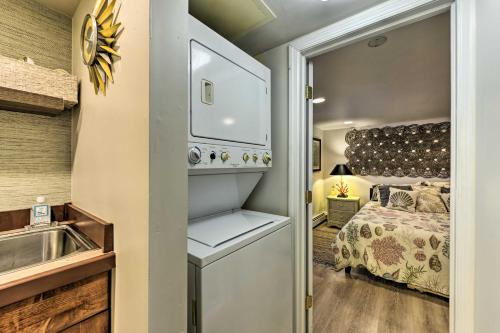 a small kitchen with a sink and a bed in a room at Cozy Ventnor Getaway Walk to Public Beach! in Ventnor City