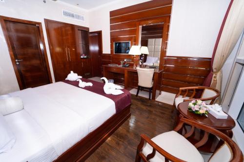 Katil atau katil-katil dalam bilik di Queen Palace Hotel