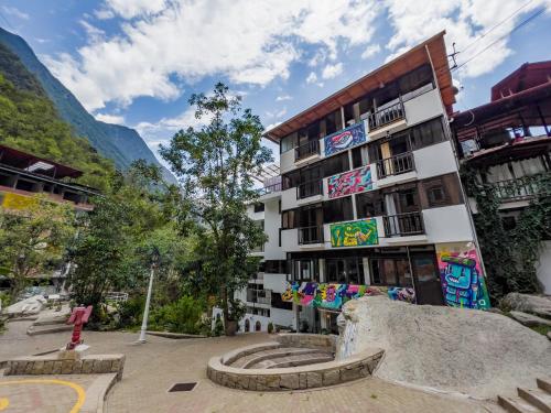 a building with a skate park in front of it at Supertramp Hostel Machupicchu in Machu Picchu