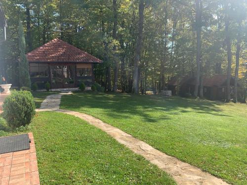 a gazebo in the middle of a yard at Villa Gagula in Sarajevo