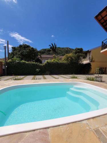 Kolam renang di atau dekat dengan Partiu Praia SC piscinas privativas, ar condicionado, internet, próximo ao mar e centrinho três minutos a pé