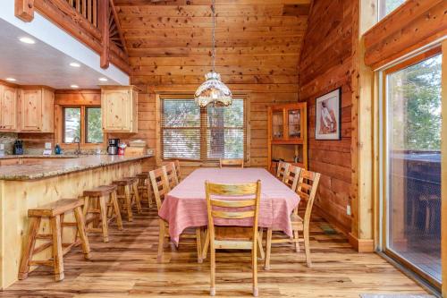 a dining room with a table and chairs at Scenic Wonders & Apt. in Yosemite West
