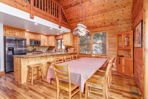 a dining room and kitchen with a table and chairs at Scenic Wonders & Apt. in Yosemite West