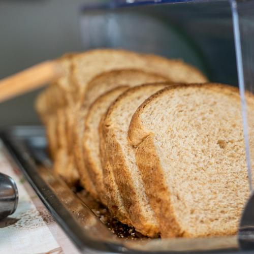 a loaf of bread sitting on top of a pan at Pousada Bellissima Italia in Luis Correia