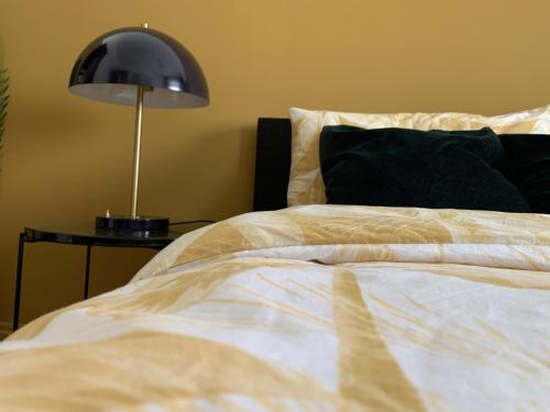 Apartamento Luxury Mira Espanha na Guarda tesisinde bir odada yatak veya yataklar
