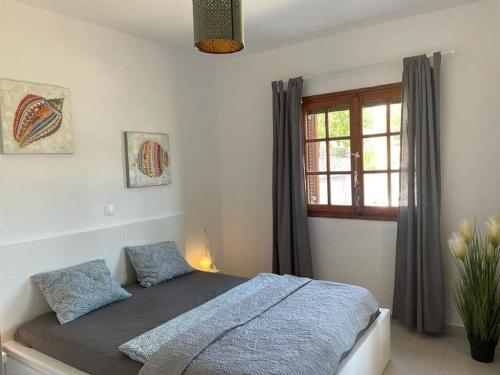 Postel nebo postele na pokoji v ubytování Holiday aptm - MorningSun1 - Sithonia