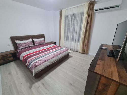 Un pat sau paturi într-o cameră la Apartament Ghencea Residence 158 Floor 4