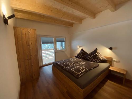 Postel nebo postele na pokoji v ubytování Alpenliebe Pitztal