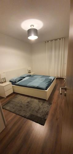 Postel nebo postele na pokoji v ubytování SDP Marina Apartment