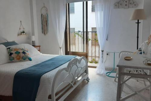 Ένα ή περισσότερα κρεβάτια σε δωμάτιο στο Apartamento baños Árabes