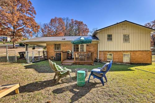 a house with three chairs in front of it at Modern Birmingham Escape with Yard and Fire Pit! in Birmingham