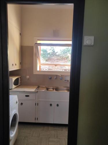 Kuchyň nebo kuchyňský kout v ubytování Apartamentos Can bruguera 2