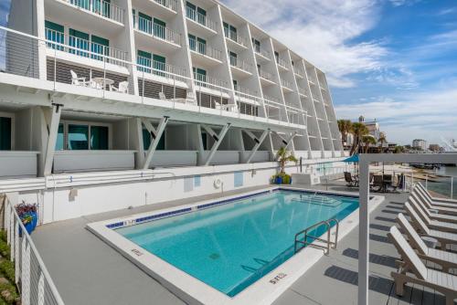 a swimming pool in front of a hotel at Inn on Destin Harbor, an Ascend Collection Hotel in Destin