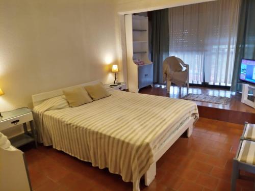 Ένα ή περισσότερα κρεβάτια σε δωμάτιο στο Departamento Rebagliatti 170