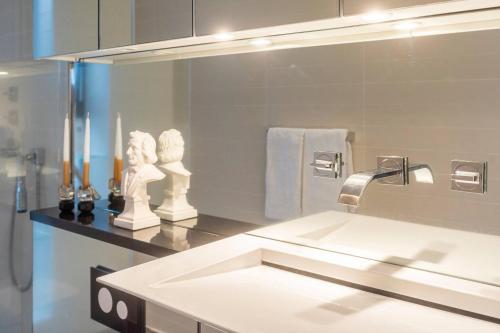 a bathroom with a sink and a mirror at Stay Iceland apartments - S 46 in Reykjavík