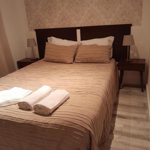 Säng eller sängar i ett rum på Villa Regio