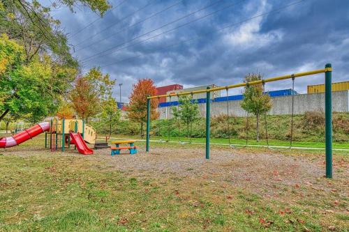a park with a playground with a slide at Beautiful Modern home with all year use HOT TUB, Pool table, Game room, & Propane fire pit!! in Ferndale