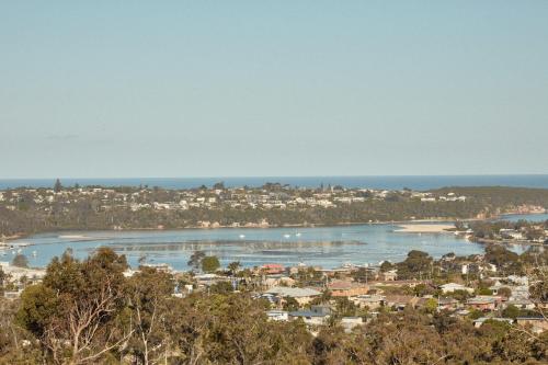 a view of the city of launceston and the ocean at Hillcrest Merimbula in Merimbula