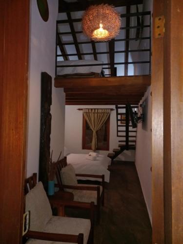 Ένα ή περισσότερα κρεβάτια σε δωμάτιο στο Hotel la Casita de Toñito