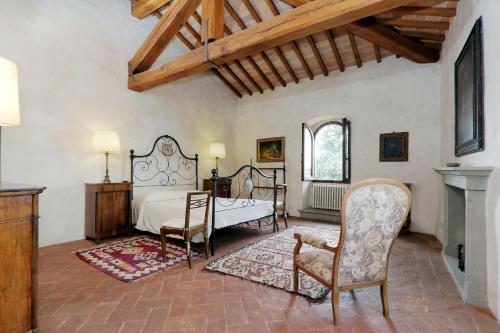Кровать или кровати в номере Castello di Bibbione